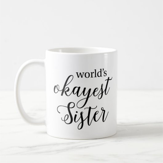 世界のOkayestの姉妹のマグ コーヒーマグカップ (左)