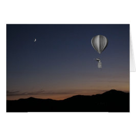 世界旅行者。熱気球、日没、月