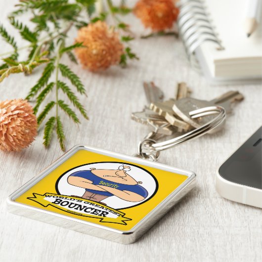 世界最大級のバウンサーの男性の漫画 キーホルダー (側面)