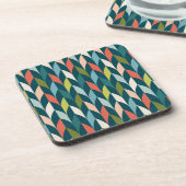 世紀半ばのモダンなティール（緑がかった色）及び珊瑚パターン コースター (左側)