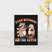 中毒カウンセラーRacoon Opossumの有害性低減 カード (黄色い花)