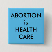 中絶は健康気に黒い文字でスカイブルー 缶バッジ (正面)