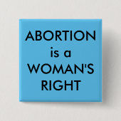 中絶は女性の右黒い文字でスカイブルー 缶バッジ (正面)