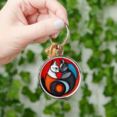 丸いデザイン鮮やかの2匹 キーホルダー (手)