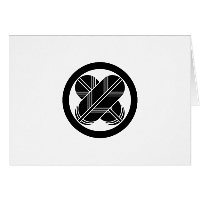 丸に違い鷹の羽 (正面横)