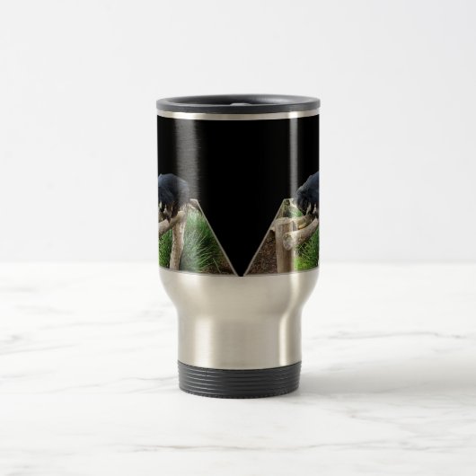 丸太の上に黒いビントロンが立っていた トラベルマグ (中央)