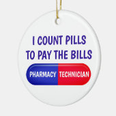 丸薬を数えて勘定を払う セラミックオーナメント (左)