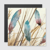 乾燥した草の背景に水色の羽 (正面/裏面)