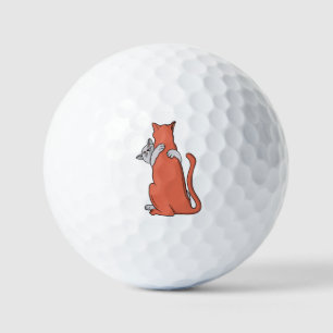 二匹の猫の友情 ゴルフボール