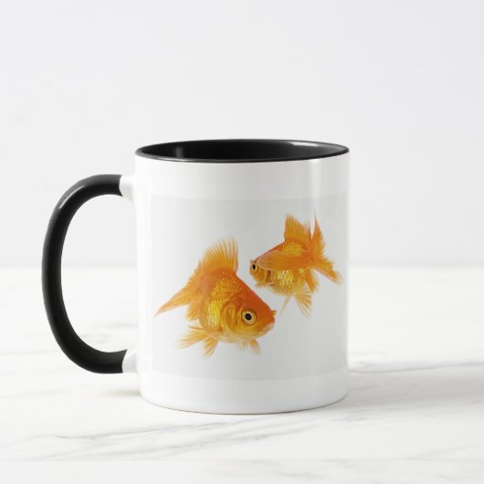 互いを交差させている2金魚 マグカップ (左)