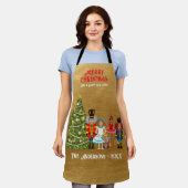 五つメリークリスマスのナツクラッカーおもしろいファミリー エプロン (着用した状態)
