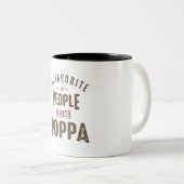 人々お気に入りのはポッパと呼ぶ ツートーンマグカップ (正面右)