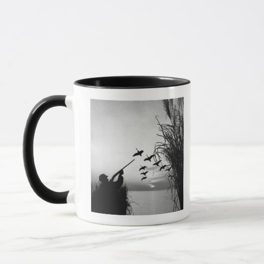 人のアヒルの狩り マグカップ (左)