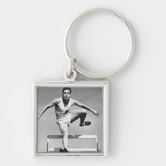 人の飛び越すこと キーホルダー (正面)