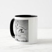 人の飛び越すこと マグカップ (正面左)