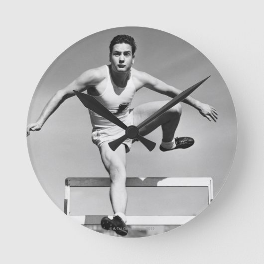 人の飛び越すこと ラウンド壁時計 (正面)