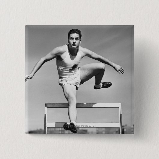 人の飛び越すこと 缶バッジ (正面)