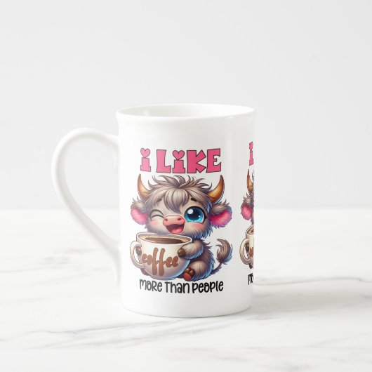 人よりコーヒーが好き ボーンチャイナマグカップ (左)