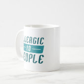 人アレルギーである コーヒーマグカップ (正面左)