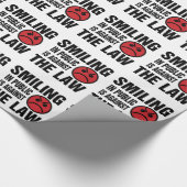 人前で微笑むのは法に反する ラッピングペーパー (角)