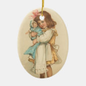 人形を持つヴィンテージのクリスマスの挨拶の女の子 セラミックオーナメント (正面)