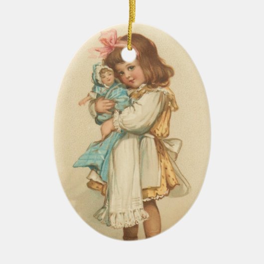 人形を持つヴィンテージのクリスマスの挨拶の女の子 セラミックオーナメント (正面)