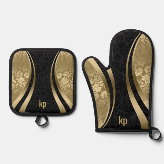 人目を引く金ゴールドブラックダマスクのダイナミックライン 鍋つかみ&鍋敷きセット (正面)
