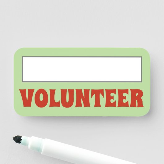 人目を引く「VOLUNTEER」の名前タグ 名札 (インサイチュ)
