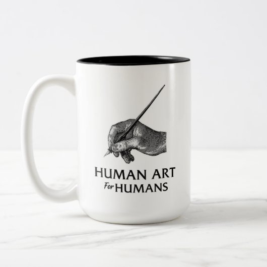 人間による人間のためのアート ツートーンマグカップ (左)