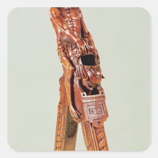 人間の型枠の中のクルミのクラッカー スクエアシール (正面)