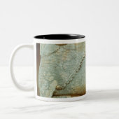 人間の形をした雄牛の浅浮き彫り ツートーンマグカップ (左)