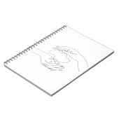 人間の手のウク保護ライナ。ウクライナ語 ノートブック (左側)