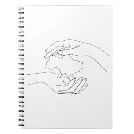 人間の手のウク保護ライナ。ウクライナ語 ノートブック