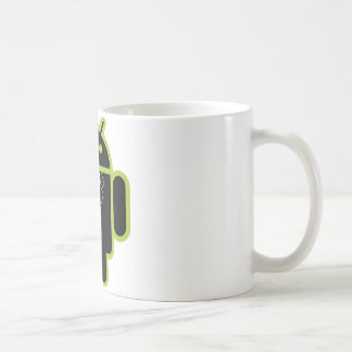 人間の特徴をもつ緑の上のスーツ コーヒーマグカップ