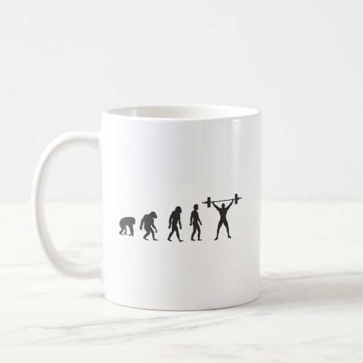 人類の進化 コーヒーマグカップ (左)