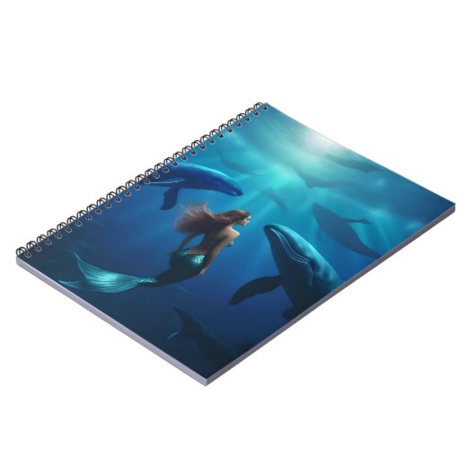 人魚のひいさまは、ザトウクジラと一緒に泳いでいます。 ノートブック (左側)