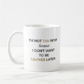 今は日焼けしないおもしろい コーヒーマグカップ (左)