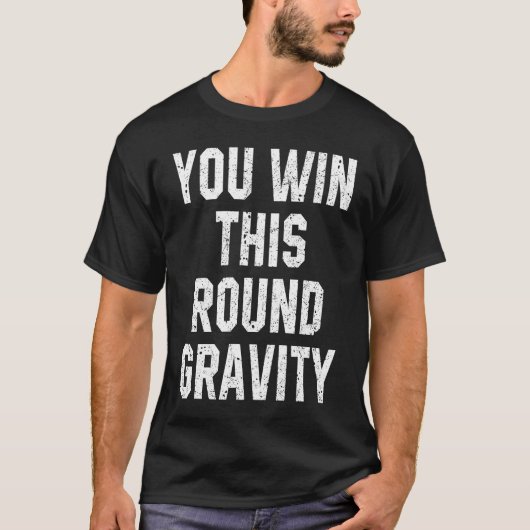 今ラウンドの勝者 重力 骨折リカバリー Tシャツ (正面)