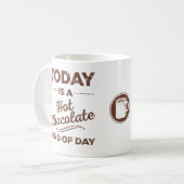 今日はホットチョコレートの一種のデイマグだ コーヒーマグカップ (正面左)