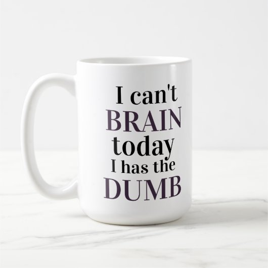 今日は頭が痛くてばかだ コーヒーマグカップ (左)