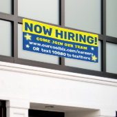 今、採用は、チ救済ームの従業員に入るよう求められています 横断幕 (ビルの外側)