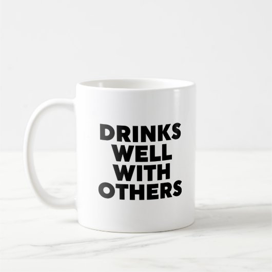 他の人と一緒によく飲む コーヒーマグカップ (左)