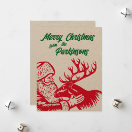 伝統的な木版画のサンタクロースとトナカイ シーズンカード