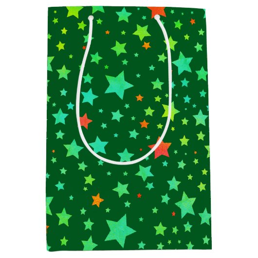 伝統的な赤と緑のホリデースターパターン ミディアムペーパーバッグ (正面)