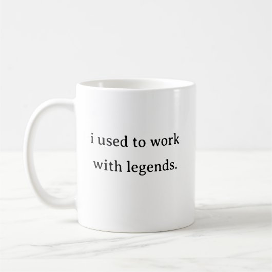 伝説の人と仕事してたマグカップ コーヒーマグカップ (左)
