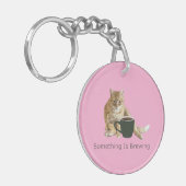 何かがピンクのアクリルのキーチェーンを醸造している キーホルダー (正面左)