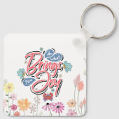 何があなたにもたらすフローラと蝶の引用文 キーホルダー (裏面)