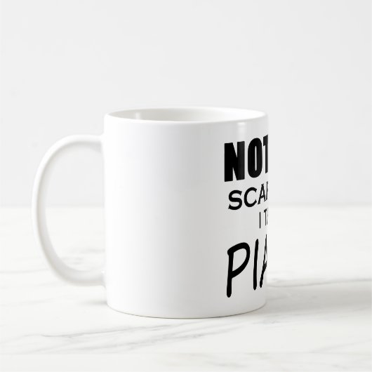 何も私のピアノを恐れない コーヒーマグカップ (左)