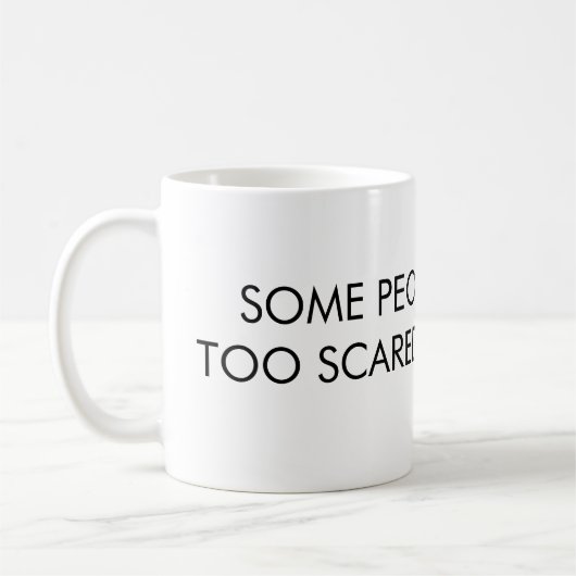 何人かの人々失敗のちょうど余りにおびえています コーヒーマグカップ (左)