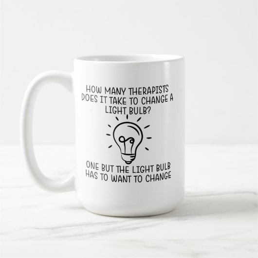 何人のセラピストがマッサージセラピー コーヒーマグカップ (左)